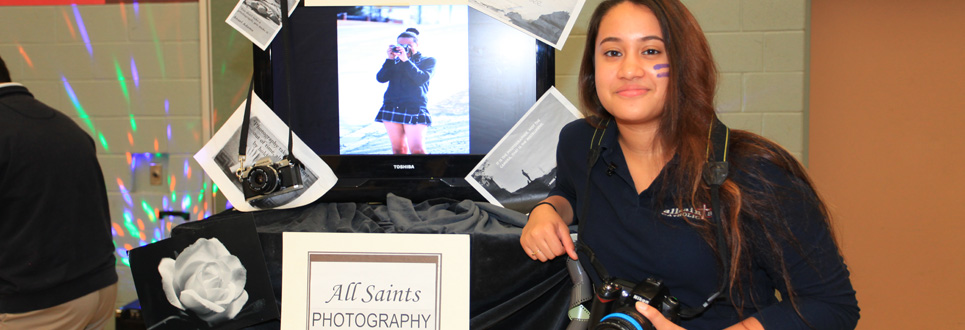 Students standing at photography booth